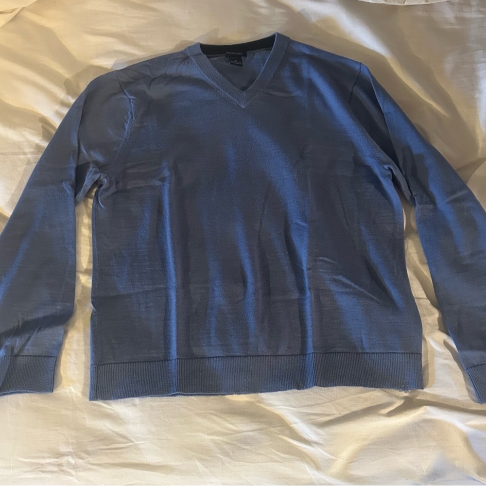 Blue V-neck sweater
